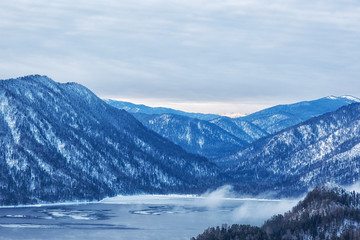 Fototapeta na wymiar Teletskoye lake in winter, Altai, Russia