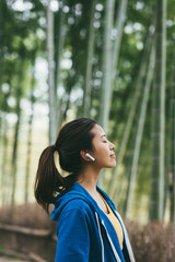 Fototapeta premium young asian beauty woman listening to music with headphone