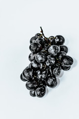 black grapes on an isolated background top view. of black grapes