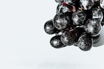 black grapes on an isolated background top view. of black grapes