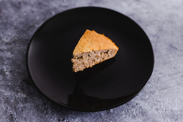 plant-based food, slice of vegan banana bread with flax seeds cinnamon and maple syrup