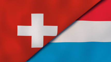 The flags of Switzerland and Luxembourg. News, reportage, business background. 3d illustration