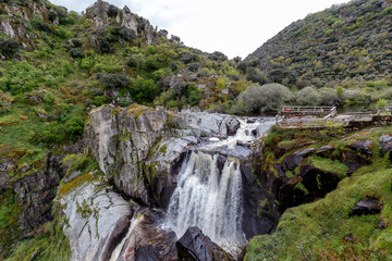 Obraz premium Waterfall Pozo de los Humos (smoke pit) in Spain. Famous tourist attractions and landmarks destination in Salamanca. Spain.