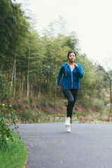 young asian beauty woman running outdoors