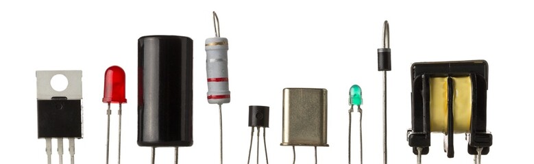 Different electronic parts or components isolated on white with resistors, capacitors, diode, led...
