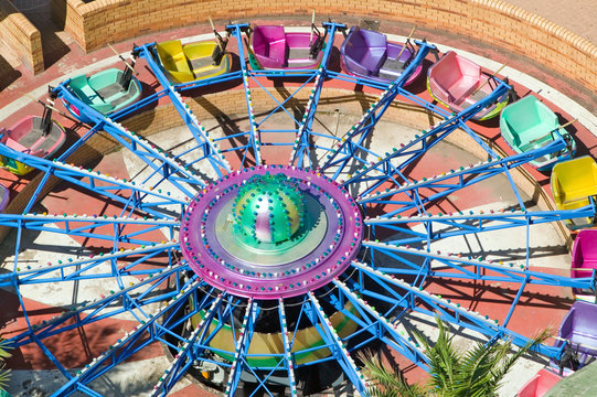 Elevated View Of Brightly Colored Carnival Car Rides In Durban, South Africa