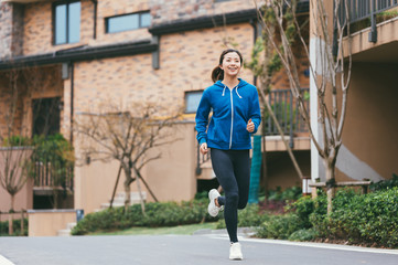 young asian beauty woman running outdoors
