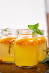 Vitaminic healthy sea buckthorn tea, Virus protection drink, coronavirus, immunity concept.