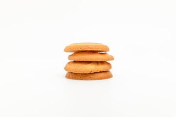 Fototapeta na wymiar Butter-flavored cookies on white background