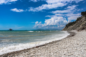 Blue abyss, a picturesque wild beach at the foot of the rocks in the vicinity of the resort of Gelendzhik. the path to the wild beach lay through the forest and the campground