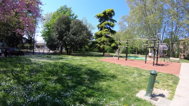 Panning View of Empty Children's Park Due to Coronavirus (COVID-19) on a Bright Sunny Spring Day in Toulouse, France
