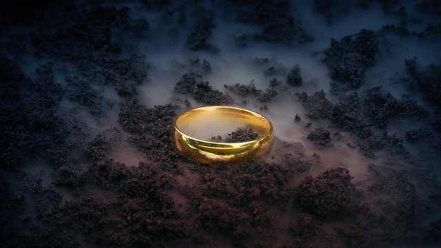 Gold Ring On Smoky Volcano Ground
