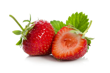 strawberries, whole one  another half,  isolated on white backgraund