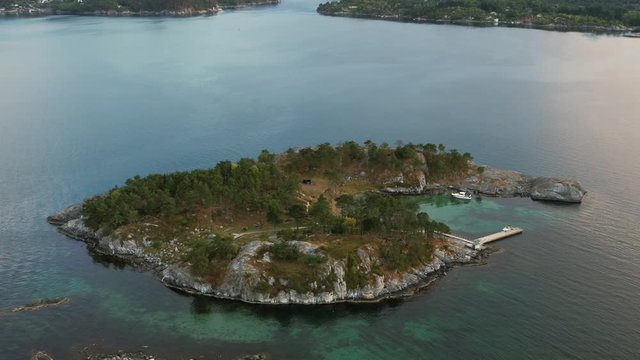 drone flying over small private island in Norway, drone stock footage by DroneRune