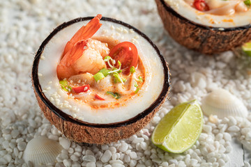 Fresh Tom Yum soup with shrimps and coconut milk