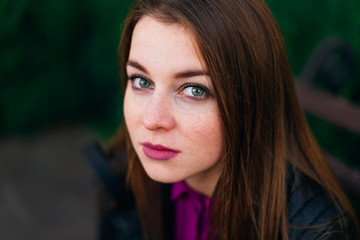 sensitive pretty girl looking at camera with sad eyes