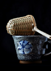 Tea culture. Traditional, handcrafted ceramic isolated on black background. 