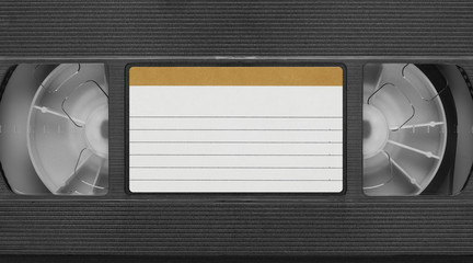old Video Cassette tape with blank label. Top view