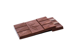 Beautiful milk chocolate lies on a white background