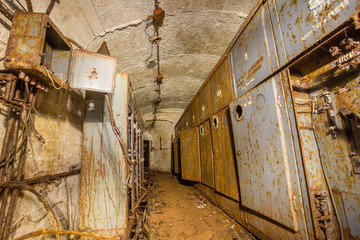 Fototapeta na wymiar Underground abandoned bauxite ore mine tunnel electric room