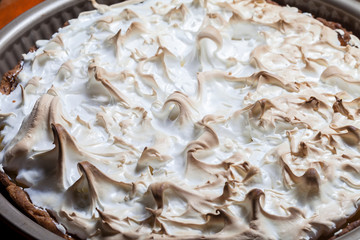 Freshly baked lemon pie. Lemon Kurd Tart with Meringue