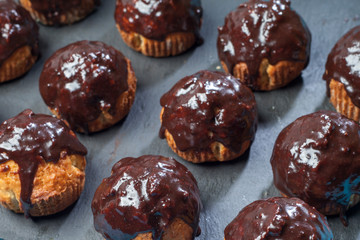 Delicious Chocolate Muffins. Homemade muffin with chocolate topping. Easter sweet dessert. Close up view.