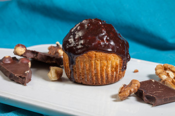 Delicious Chocolate Muffins. Homemade muffin with chocolate topping. Easter sweet dessert. Close up view.