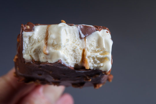 Chocolate popsicle popsicle on a stick. Bite Salted Caramel Filling