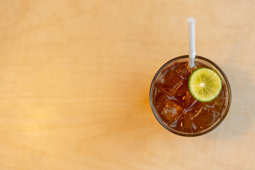 Top angle view of Lemon Iced Tea on table with copy space