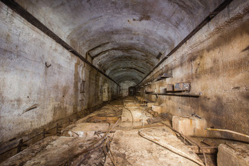 Underground abandoned bauxite ore mine tunnel with concrete lining