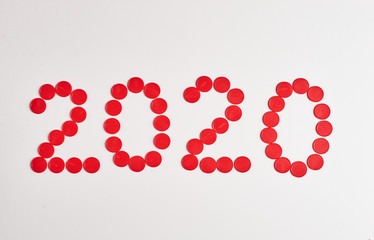 number two thousand twenty from red circles on a white background