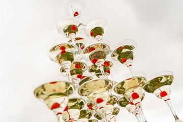 wedding, pyramid, glasses, buffet, ceremony decoration, red, white, snowman, holiday, celebration, flower, food, bouquet, decoration, gift, tree, table, green, glass, dessert, silver, flowers,