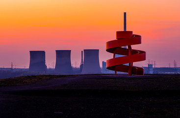 Landmark in Hamm Westfalen in the Ruhrgebiet at sunset in front of a power plant - obrazy, fototapety, plakaty