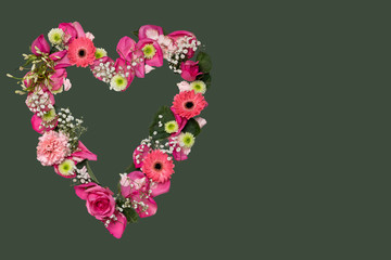 romantic heart of flowers for valentine in pink green red white with green background