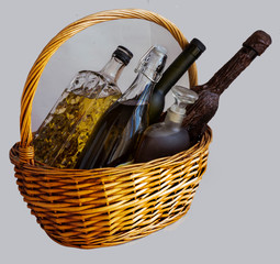 an old basket full of bottles of old drinks