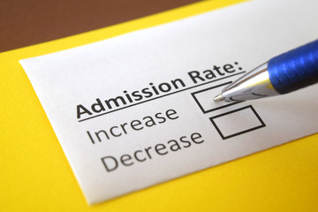 Obraz premium One person is answering question about admission rate.