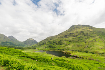 Fototapeta na wymiar Hills and lake in Scotland