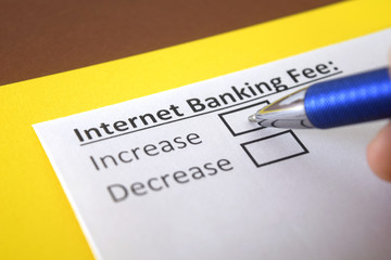 Obraz premium One person is answering question about internet banking fee.