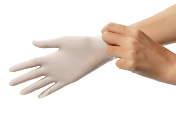 doctor putting on sterile gloves isolated on white background with clipping path