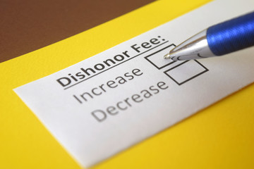 Fototapeta premium One person is answering question about dishonor fee.
