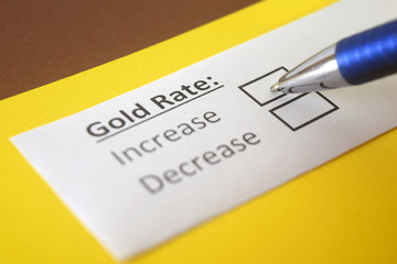 Fototapeta premium One person is answering question about gold price.
