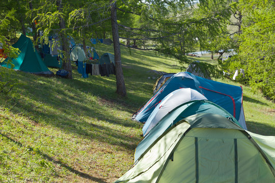 Lake Baikal in summer. Tourists often set up a camp near the fishing village of Uzury on the eastern shore of Olkhon Island on a hillside near Haga-Yaman Bay. Summer travel