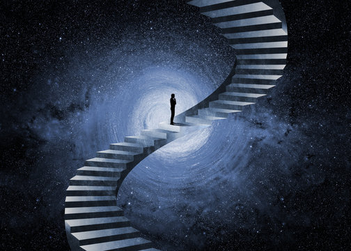 Man Thinking In Front Of An Impossible Staircase