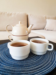 Fototapeta na wymiar cup of tea and teapot