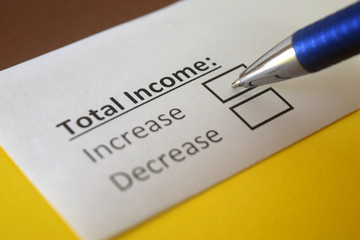 Obraz premium One person is answering question about total income.