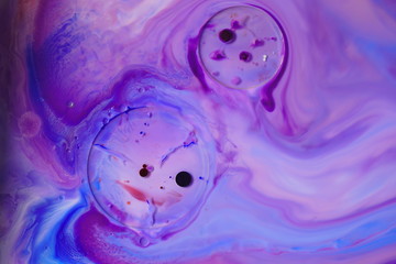 Abstract colors, backgrounds and textures. Food Coloring in milk. Food coloring in milk creating bright colorful abstract backgrounds. Colorful chemical experiment