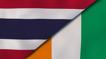 The flags of Thailand and Ivory Coast. News, reportage, business background. 3d illustration