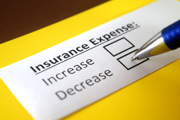 Obraz premium One person is answering question about insurance expense.