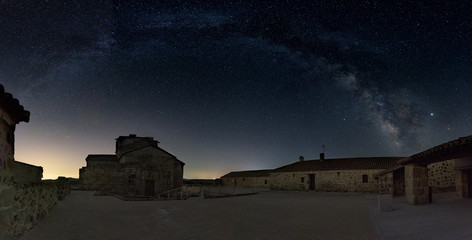 Night landscape with colorful milky way over Church of Santa María de Melque located in toledo...