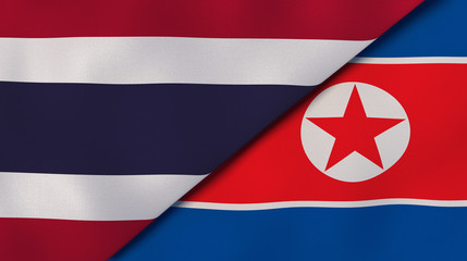 The flags of Thailand and North Korea. News, reportage, business background. 3d illustration